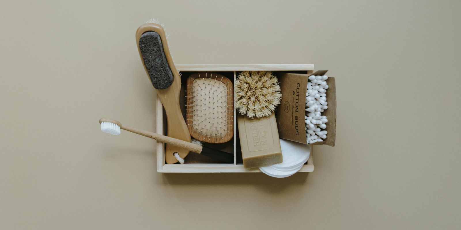 toiletries on a wooden tray