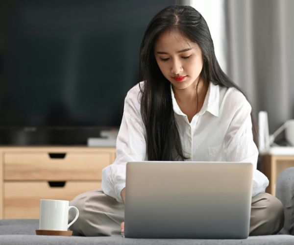 Woman on laptop at home