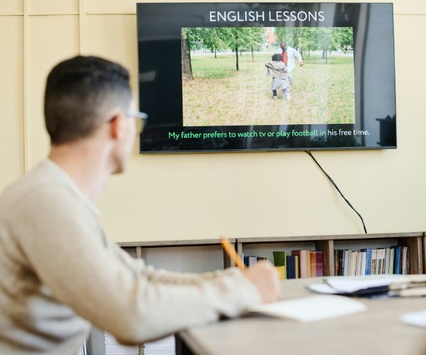 Man studying English lesson.